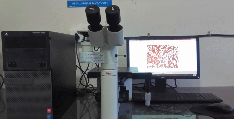 Metallurgical microscope with photographic attachment